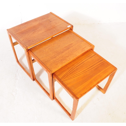 690 - British Modern Design - A mid 20th century teak wood nest of tables. The tables rectangular in shape... 