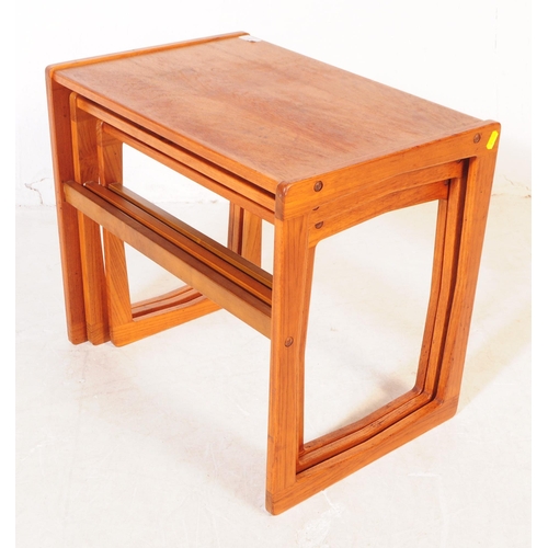 690 - British Modern Design - A mid 20th century teak wood nest of tables. The tables rectangular in shape... 