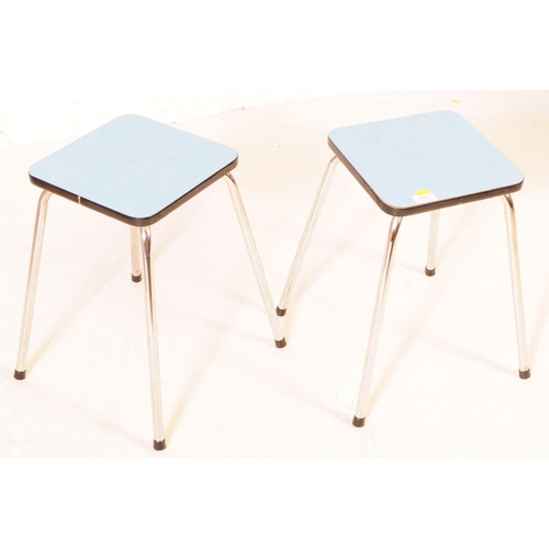 693 - British Modern Design - A pair of mid 20th century formica and chrome stools / side tables. Each sto... 