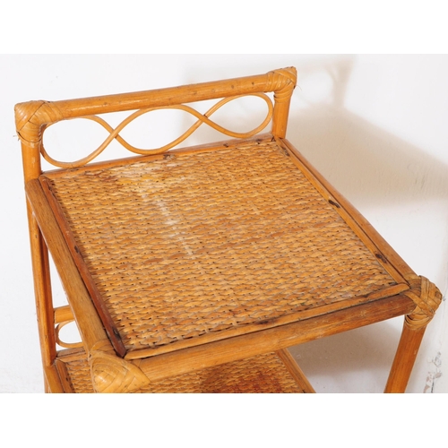 694 - A collection of four mid 20th century bamboo and wicker etagere shelving whatnots. Each etagere feat... 