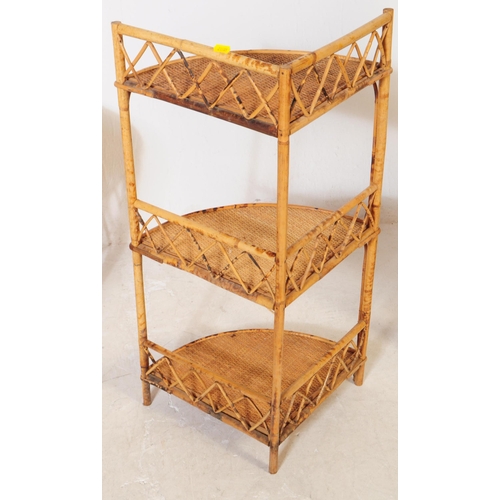 694 - A collection of four mid 20th century bamboo and wicker etagere shelving whatnots. Each etagere feat... 