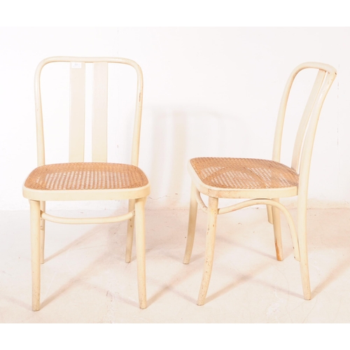 695 - Thonet Manner - A collection of six Thonet manner bentwood and rattan bistro dining chairs. Each cha... 