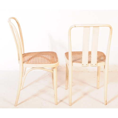 695 - Thonet Manner - A collection of six Thonet manner bentwood and rattan bistro dining chairs. Each cha... 