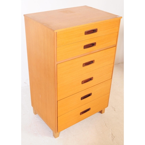 699 - British Modern Design - A mid 20th century light oak pedestal chest of drawers. The chest raised on ... 