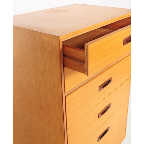 699 - British Modern Design - A mid 20th century light oak pedestal chest of drawers. The chest raised on ... 