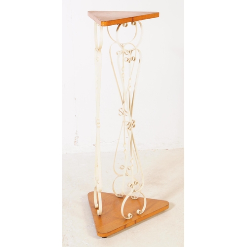 700 - A pair of mid 20th century wood and metal jardinière plant stands. The stands having triangular wood... 