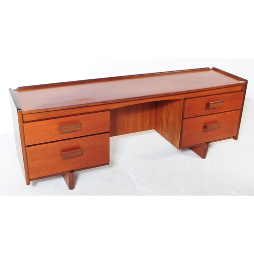 701 - White and Newton - A mid 20th century White and Newton teak wood sideboard dressing table desk. The ... 