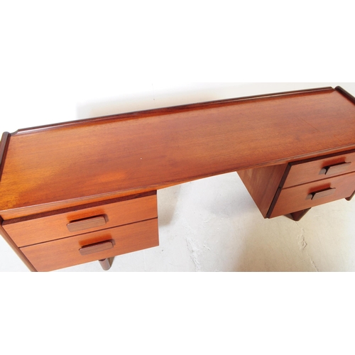 701 - White and Newton - A mid 20th century White and Newton teak wood sideboard dressing table desk. The ... 