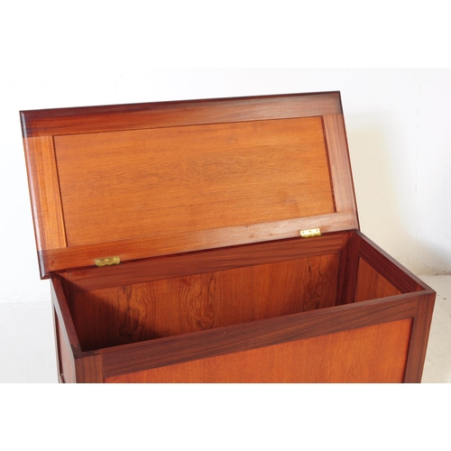 702 - British Modern Design - A mid 20th century teak and afromosia wood blanket box coffer. The blanket b... 