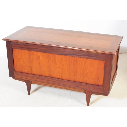 702 - British Modern Design - A mid 20th century teak and afromosia wood blanket box coffer. The blanket b... 