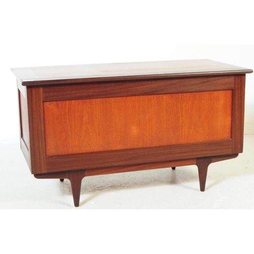 702 - British Modern Design - A mid 20th century teak and afromosia wood blanket box coffer. The blanket b... 