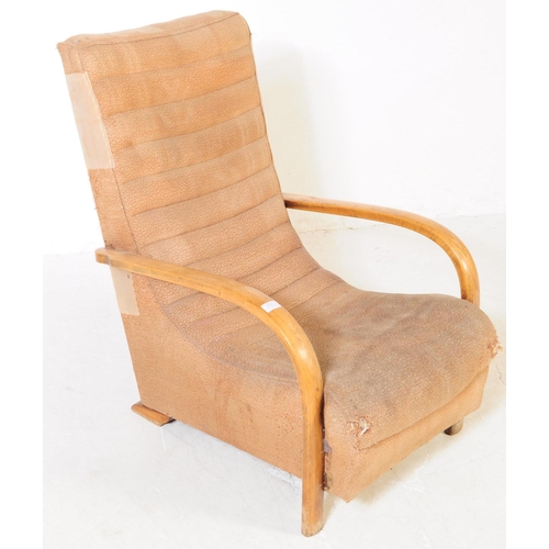 703 - A mid 20th century circa 1940s post war Art Deco bentwood armchair / lounge chair. The chair having ... 