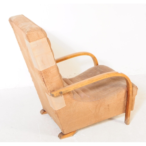 703 - A mid 20th century circa 1940s post war Art Deco bentwood armchair / lounge chair. The chair having ... 