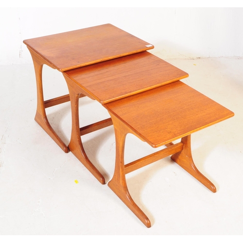 708 - G-Plan - A mid 20th century G-Plan teak wood nest of tables. The nest of tables rectangular in shape... 