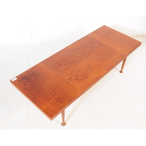 709 - Meredew Furniture - A mid 20th century Meredew furniture teak wood coffee table. The table of rectan... 