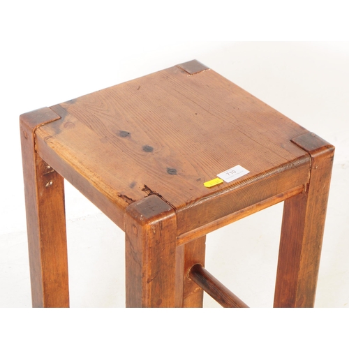 710 - An early 20th century rustic oak wood farmhouse stool / side table. The table raised of square form,... 