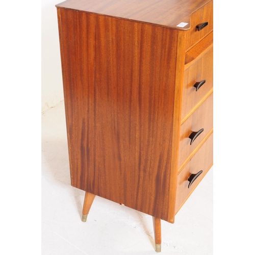 714 - Austinsuite - A mid 20th century Austinsuite teak veneered chest of drawers. The chest having a bank... 