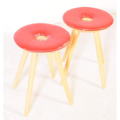 716 - A pair of retro mid 20th century vinyl and elm wood stools. The stools raised on four tapered rounde... 