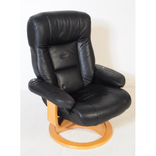 720 - Ekornes - A 20th century Ekornes Stressless reclining armchair / lounge swivel chair. The reclining ... 