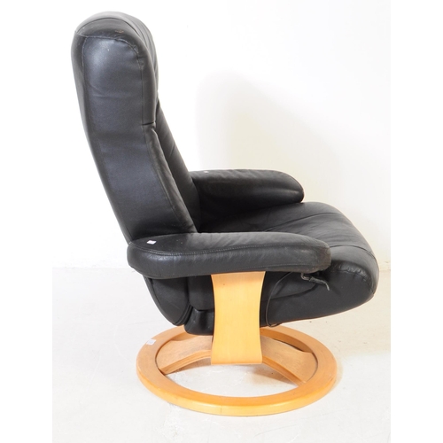 720 - Ekornes - A 20th century Ekornes Stressless reclining armchair / lounge swivel chair. The reclining ... 