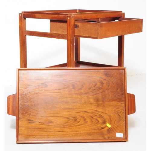 728 - A vintage later 20th century teak two tier serving / butler's trolley. Rectangular form with gallery... 