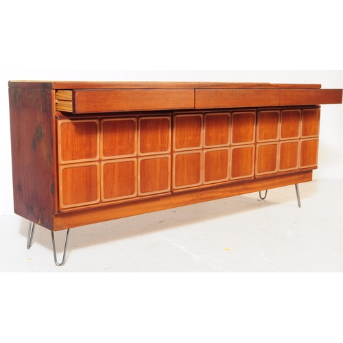 730 - McIntosh Furniture - A mid 20th century McIntosh Furniture teak wood sideboard credenza. The sideboa... 