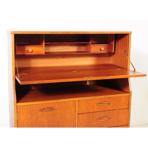 731 - Jentique - A mid 20th century Jentique teak wood bureau writing desk. The bureau raised on tapered l... 