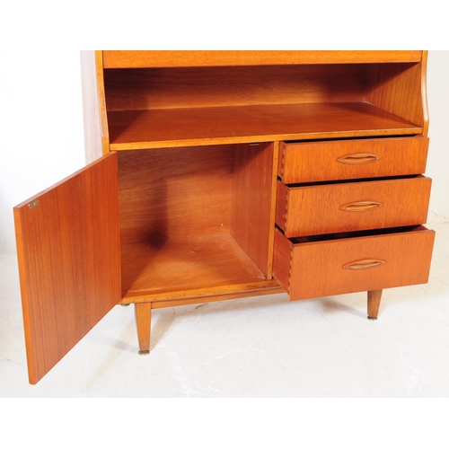 731 - Jentique - A mid 20th century Jentique teak wood bureau writing desk. The bureau raised on tapered l... 