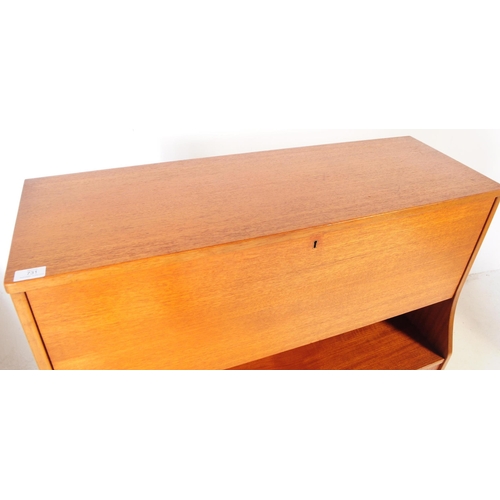 731 - Jentique - A mid 20th century Jentique teak wood bureau writing desk. The bureau raised on tapered l... 