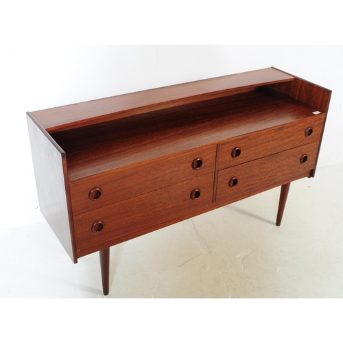 732 - Danish Modern Design - A mid 20th century walnut veneered sideboard credenza. The sideboard raised o... 