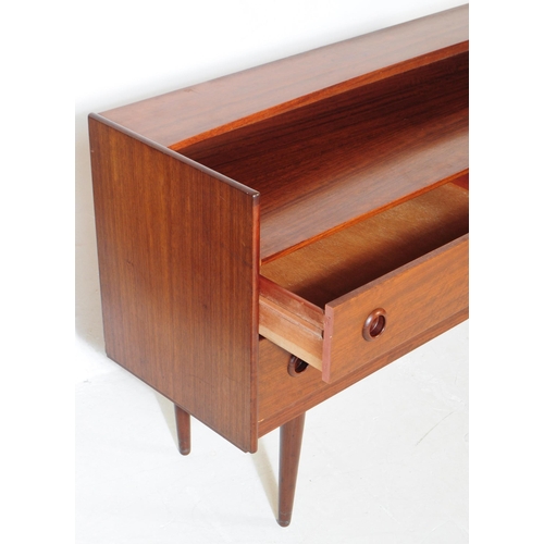 732 - Danish Modern Design - A mid 20th century walnut veneered sideboard credenza. The sideboard raised o... 