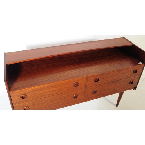 732 - Danish Modern Design - A mid 20th century walnut veneered sideboard credenza. The sideboard raised o... 