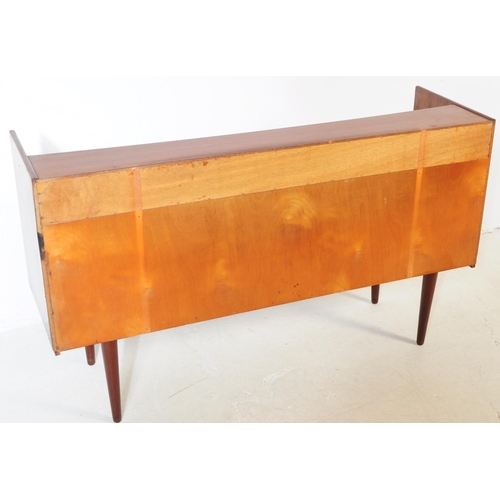 732 - Danish Modern Design - A mid 20th century walnut veneered sideboard credenza. The sideboard raised o... 