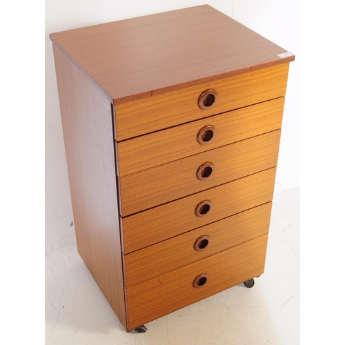 734 - Schreiber Furniture - A mid 20th century Schreiber veneered pedestal chest of drawers. The chest of ... 