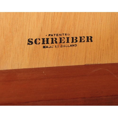 734 - Schreiber Furniture - A mid 20th century Schreiber veneered pedestal chest of drawers. The chest of ... 