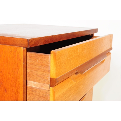 741 - British Modern Design - A mid 20th century British Modern Design teak chest of drawers. The chest of... 