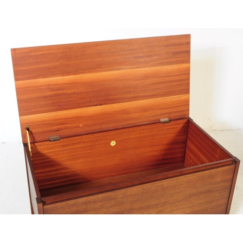 742 - Meredew Furniture - A mid 20th century oak blanket box coffer chest. The chest raised on block feet,... 