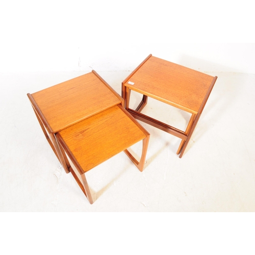 744 - G-Plan - A collection of mid 20th century G-Plan teak wood nesting tables. To include two part nests... 