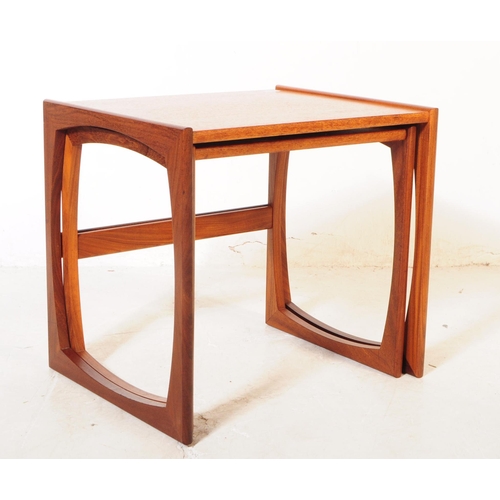 744 - G-Plan - A collection of mid 20th century G-Plan teak wood nesting tables. To include two part nests... 