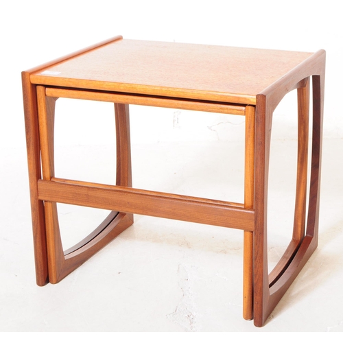 744 - G-Plan - A collection of mid 20th century G-Plan teak wood nesting tables. To include two part nests... 