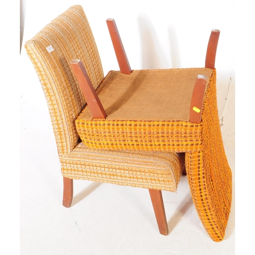 747 - British Modern Design - A pair of mid 20th century easy chairs / lounge chairs. The chairs both upho... 