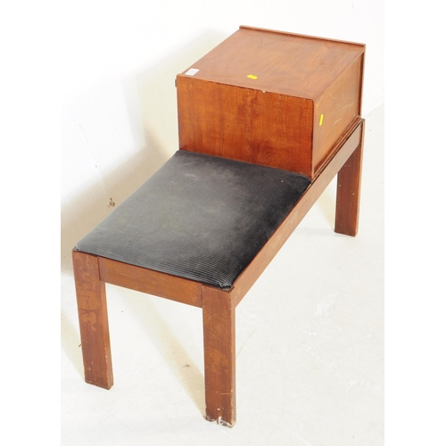 757 - British Modern Design - A branded Chippy telephone hall seat. Teak construction with pigeon hole / p... 