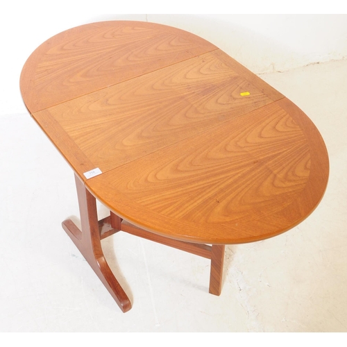 758 - G Plan Furniture - A late 20th century teak space saver drop leaf dining table. Of rectangular form ... 