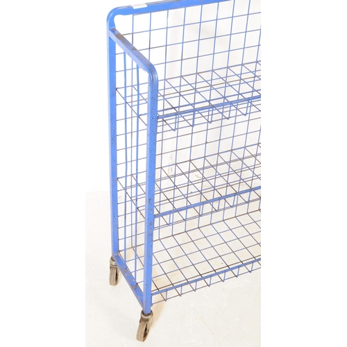 772 - A late 20th century three tier industrial / factory trolley. Of rectangular form, metal construction... 