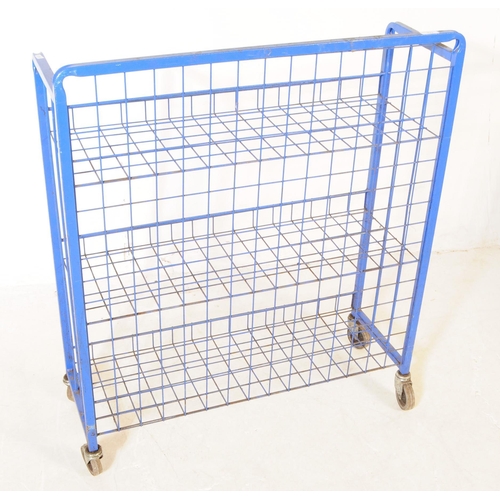 772 - A late 20th century three tier industrial / factory trolley. Of rectangular form, metal construction... 