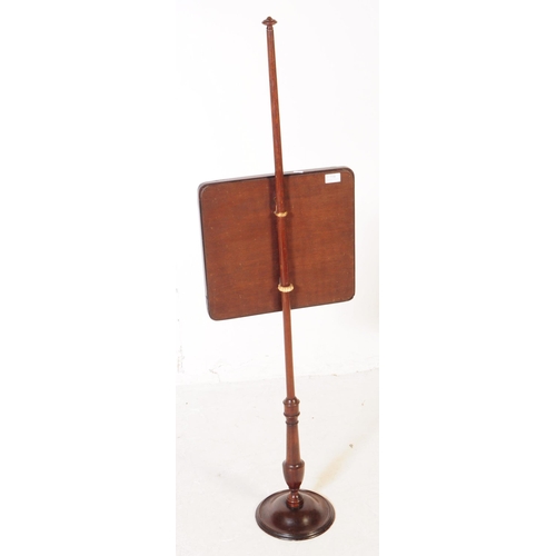 778 - A Victorian 19th century mahogany fire screen pole. With tapering central column with glazed panel w... 