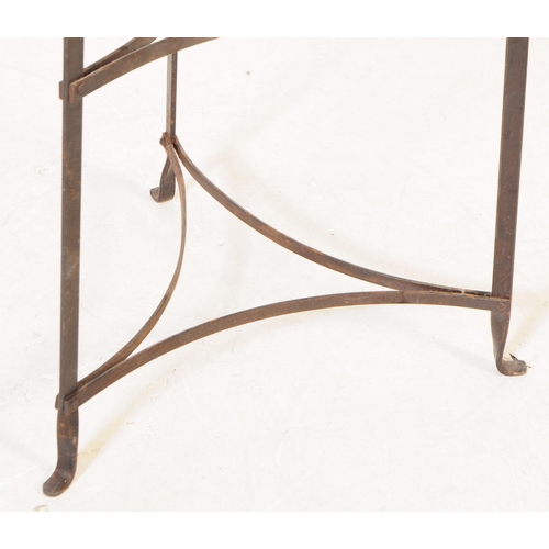 779 - A vintage 20th century wrought iron seven tier planter / plant / saucepan stand. Measures approx. 14... 