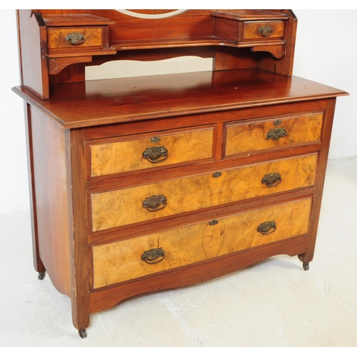 791 - An early 20th century Edwardian walnut bedroom suite. The suite comprising a dressing chest of drawe... 