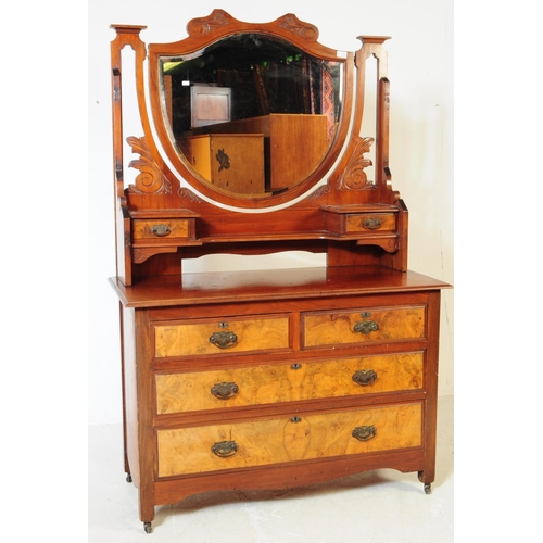 791 - An early 20th century Edwardian walnut bedroom suite. The suite comprising a dressing chest of drawe... 