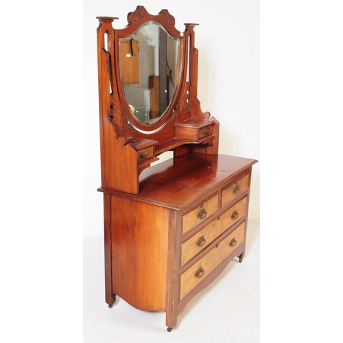 791 - An early 20th century Edwardian walnut bedroom suite. The suite comprising a dressing chest of drawe... 